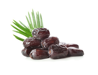 Sweet dried dates on white background