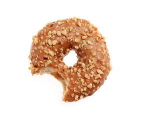Sweet bitten donut on white background