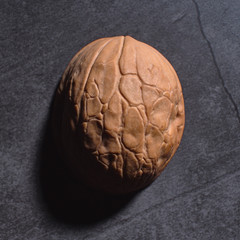 Healthy food concept, fresh nuts on the table Stylish closeup of walnuts.