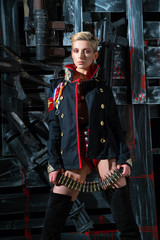 Girl in a military jacket with a machine gun tape
