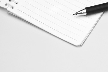 closeup pen on a paper - monochrome