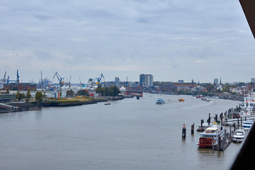 Sea pier in Germany. View of the port of Hamburg. Photo of the pier Hamburg. Cityscape of the port city of Hamburg.