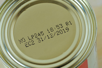 Close-up of 2019 expiration date on canned food