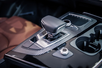 Close up of speed automatic transmission in nice passenger car