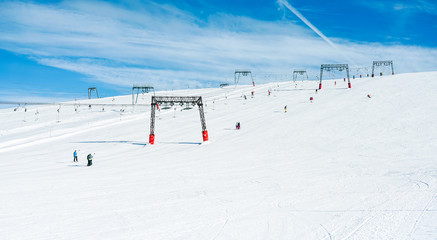 Ski and snowboard sport resort for winter vacation with cable car in background