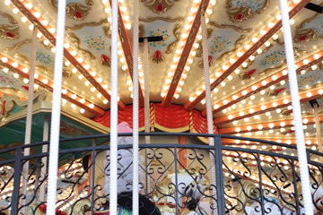 children on carousel merry go round