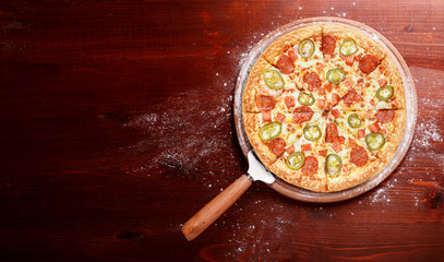 classic Italian pizza on a wooden tray, served in a small authentic Italian restaurant