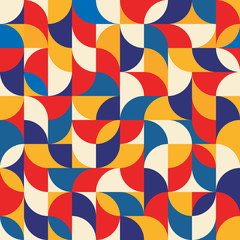 Abstract geometric background - seamless vector pattern illustration in blue, red and yellow colors. Mosaic ornament structure.