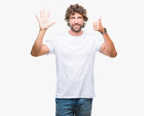 Naklejka premium Handsome hispanic model man over isolated background showing and pointing up with fingers number six while smiling confident and happy.