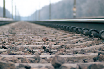 Low side shot of rail rails. Defocused to infinity railway.