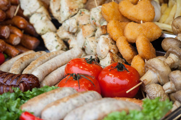 Outdoor Cuisine Culinary Buffet. Grilled sausages and Vegetable. Street Food Festival