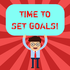 Handwriting text Time To Set Goals. Concept meaning Desired Objective Wanted to accomplish in the future Man Standing Holding Above his Head Blank Rectangular Colored Board