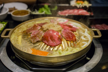 Pork grill on BBQ brass pan.