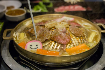 Pork grill on BBQ brass pan.