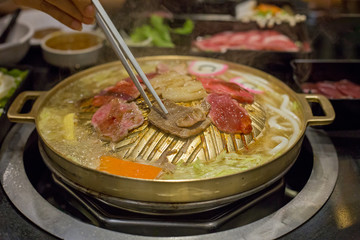 Pork grill on BBQ brass pan.