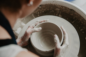 Young Women molded ceramic plate from clay