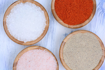 Spices in a bamboo bowls on table