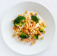 warm salad of broccoli and seafood with spicy croutons