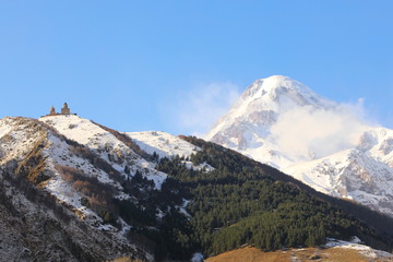 Kasbegi mountain with monastery