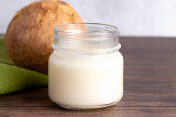 Obraz na płótnie Canvas Canning Jar of Solidified Coconut Oil A Healthy Alternative to Vegetable Oils