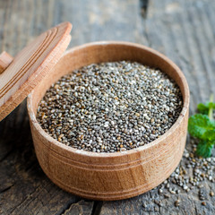 Healthy Chia seeds in a wooden bowl