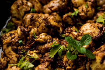 Brain / Bheja Fry of goat, sheep or lamb is a popular Indian or pakistani dish cooked on Bakra Eid(Eid-ul-zuha). served in karahi, pan or plate. selective focus