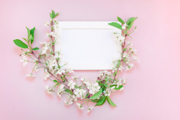 Blank frame mockup with white flowers