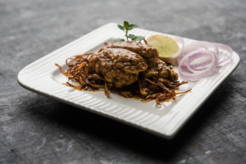 Brain / Bheja Fry of goat, sheep or lamb is a popular Indian or pakistani dish cooked on Bakra Eid(Eid-ul-zuha). served in karahi, pan or plate. selective focus