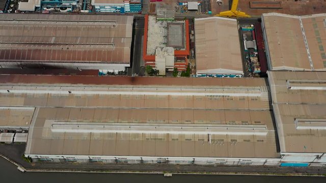 aerial view cargo and passenger seaport with ships and crane Tanjung Perak, surabaya, indonesia. docks for the repair and parking of ships, cargo port and container terminal. ship in industrial port