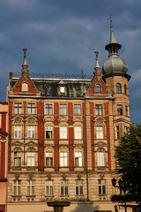 Obraz premium Facade of historic tenement house on the market in Swidnica in Poland..