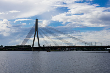 Fototapeta na wymiar Daugava River and Vansu Bridge (Vansu tilts). Riga, Latvia