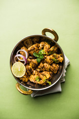 Brain / Bheja Fry of goat, sheep or lamb is a popular Indian or pakistani dish cooked on Bakra Eid(Eid-ul-zuha). served in karahi, pan or plate. selective focus