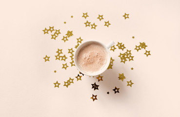 Obraz na płótnie Canvas Coffee and stars on beige