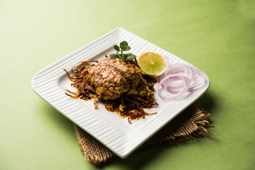 Brain / Bheja Fry of goat, sheep or lamb is a popular Indian or pakistani dish cooked on Bakra Eid(Eid-ul-zuha). served in karahi, pan or plate. selective focus