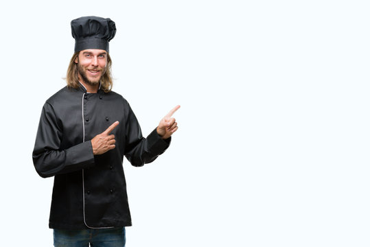 Young handsome cook man with long hair over isolated background smiling and looking at the camera pointing with two hands and fingers to the side.