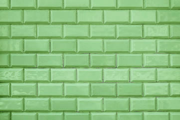 Old green tile brick wall background texture - 241601045