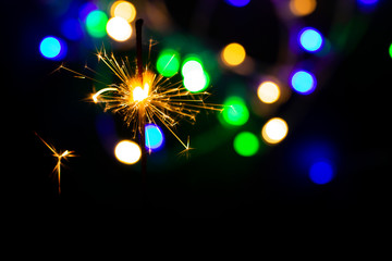 Christmas golden lights. Background of bright glow bokeh