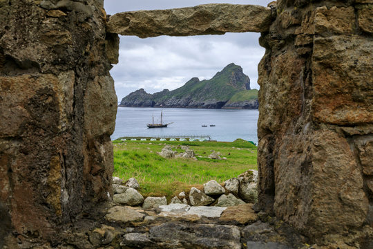 Village Bay through stone remains of evacuated village, Hirta, St. Kilda Archipelago, Outer Hebrides, Scotland
