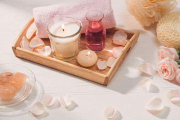 Spa and aromatherapy. Rose flower and essential oil.