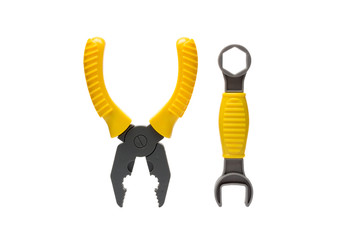 Yellow and grey toy pliers, spanner isolated on white