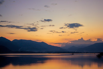 Beautiful Landscape of evening lake view that show The reflection of the mountain on the water is so beautiful.