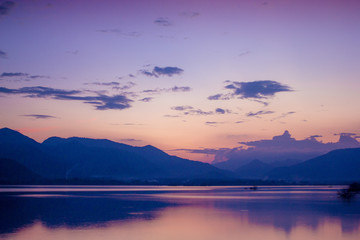 Beautiful Landscape of evening lake view that show The reflection of the mountain on the water is so beautiful.
