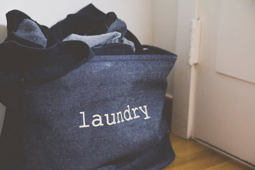 a laundry basket in the living room