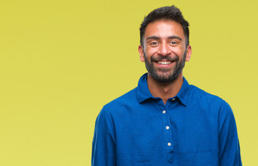 Fototapeta premium Adult hispanic man over isolated background with a happy and cool smile on face. Lucky person.