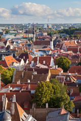 Bright colourful aerial shot of old town of Tallinn, Estonia at sunny day. Beautiful roof tops.