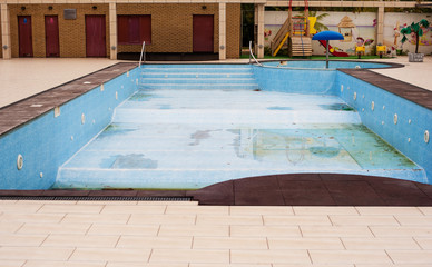 Empty outdoor swimming pool with children area