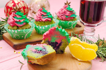 Christmas cupcakes - homemade cupcakes with spinach and ricotta cream decorated with green and pink cream.