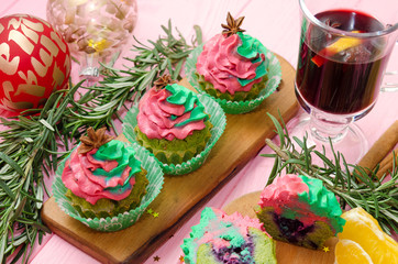 Christmas cupcakes - homemade cupcakes with spinach and ricotta cream decorated with green and pink cream.