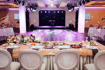 Luxury, elegant wedding reception table arrangement, floral centerpiece