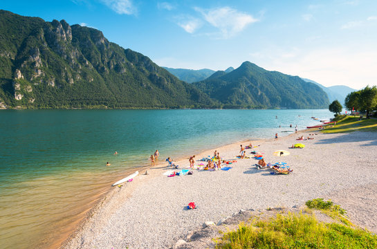 Bathers on the shores of Lake Idro, Valle Sabbia, Brescia province, Lombardy